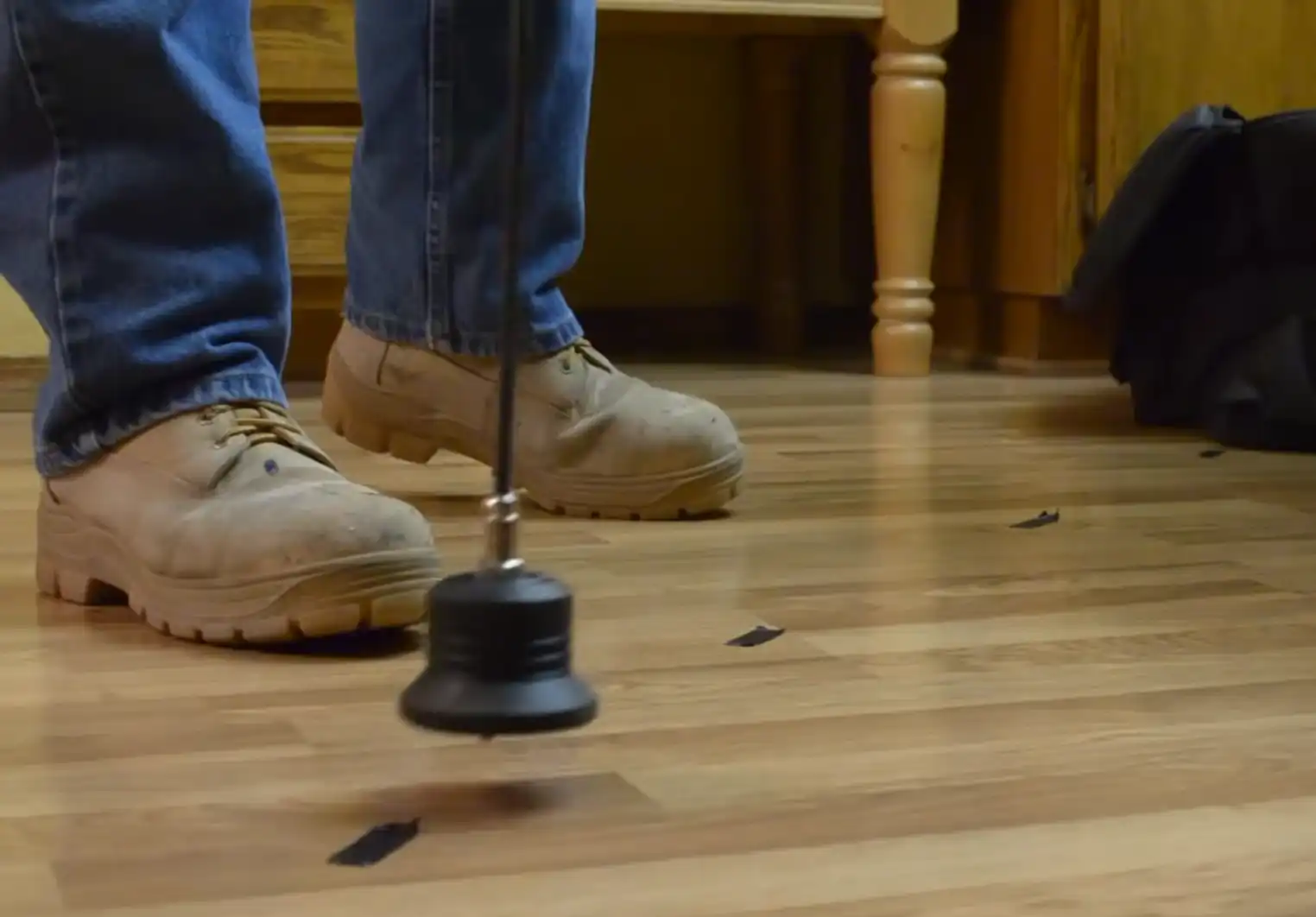 Camera inspection tool locating a cracked sewer line with root intrusion